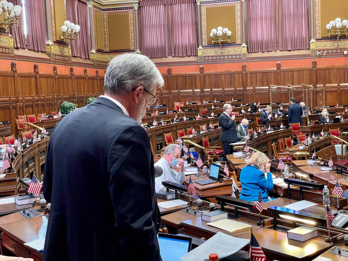 Rep. William Petit, left, and Rep. Jonathan Steinberg debate a bill curtailing religious exemptions for school-age vaccinations.